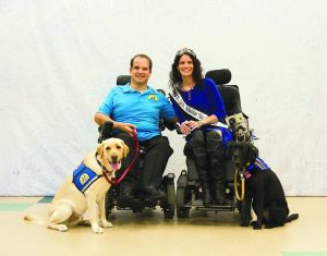 Emily Sciarretta and her husband, Frank, with their dogs Drew and Carmel. (Photo by Elizabeth Mcfarland)