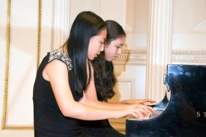 Piano Duo: Sherry Shi, Sands Point; Christine Ramirez, Glen Head. Both are grand prix prize winners at various music competitions as soloists and duo partners.