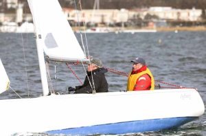 Bob Schwartz and Tom Powers, both local racers, in a downwind leg at the New Year Regatta.