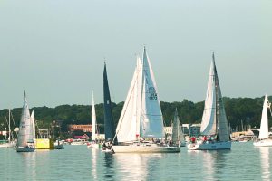 On a recent Thursday evening, a wild thunderstorm in the late afternoon sucked all the wind from Manhasset Bay. Thirsty Thursday boats were waiting for the wind to pick up. Hope springs eternal!