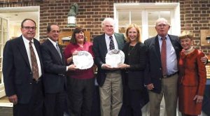 Sue Miller and John Browning came in first in everything. They are seen here accepting one of their awards, from left:  Bill McCollum, Dana Schnipper (crew), Sue Miller, John Browning, Stephanie Baas (crew), George Huntington (crew) and  MaryLu Dempsey-Palafox