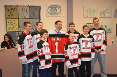 Plainedge Hockey Team Presents Jersey to School Superintendent Salina