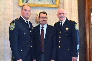 Lieutenant Thomas Ruehle with newly retired, 31-year member of the Sands Point PD, Chief Mark Mandel and new Chief of Police Richard Lertora