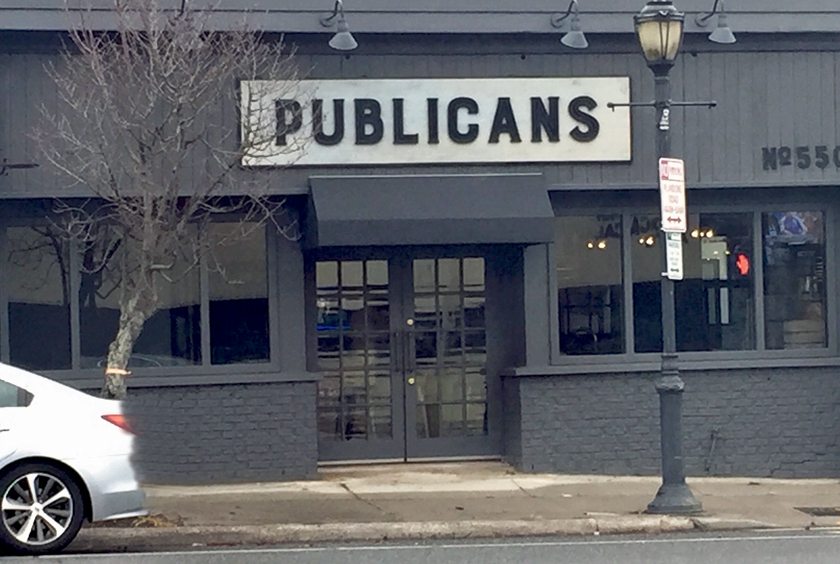 The exterior of the building is now slate grey with the new sign. (Photo by Elizabeth Johnson)