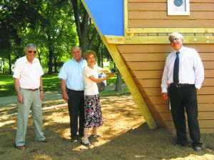 Peter Renick (far right) helped christen the new children’s playground ship at Steppingstone Park in 2012 with (from left) Commissioners Daniel M. Nachmanoff, Robert A. Lincoln, Jr., and Ruth Tamarin. As a result of Renick’s initiative, this playground promoted imaginative play and social interaction, met ADA (American Disabilities Act) regulations and provided cushioned surfacing for a safer play area. (Photo by Michele Siegel)