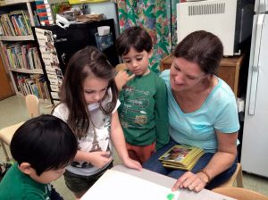Ethan Gilbert and Daphne Mallios from Manhasset with teacher Mrs. Anne-Marie Pumo