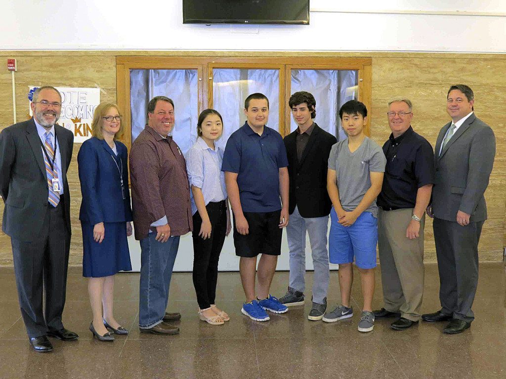 From left: Schreiber Principal Ira Pernick, Port Washington Superintendent of Schools Dr. Kathleen Mooney, music teacher Anthony Pinelli, Soobin Seo, Jonathan Kobrinsky, Jordan Lerner, Andrew Lu, music teacher Mark Brenner, and Director of Creative Arts Kevin Scully (Photo courtesy of the Port Washington School District)
