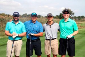 John Bowman (far right), owner of Greens Irish Pub, with his foursome out on the course