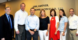 GLIRC President Mike Polansky; Lynn, Gartner, Dunne & Covello partner John Dunne; Sunrise Day Camp board member Ken Faltischek, Ellen Copeman of the Lynbrook Runner’s Stop, GLIRC Director of Operations Linda Ottaviano; Jessica Kamens of Sunrise Day Camp and Lynn, Gartner, Dunne & Covello partner Ken Gartner