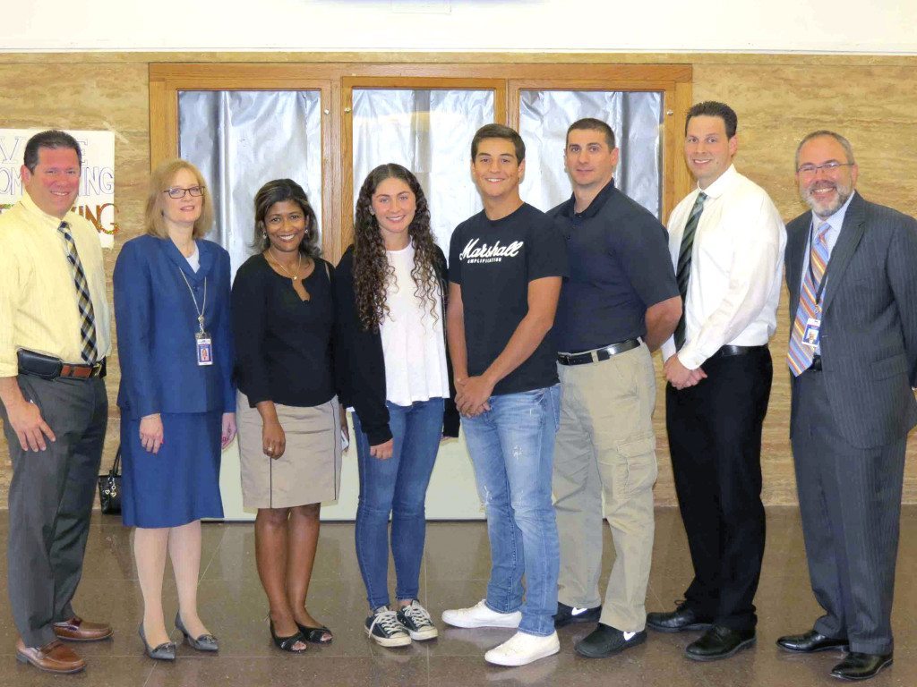 Schreiber students were commended for their accomplishments in the area of social science research. Pictured from left are Schreiber Assistant Principal David Miller, Superintendent of Schools Dr. Kathleen Mooney, social science teacher Elizabeth Dragos, students Madeline Lane and Dexter Jarach, social science teacher Petro Macrigiane, Social Studies Chairperson Lawrence Schultz and Schreiber Principal Ira Pernick. Missing from the photo is Peter Kirgis. (Photo courtesy of the Port Washington Union Free School District)