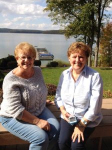 Janet Angiuli and Irene Wood outside on the beautiful deck overlooking Lake Wallenpaupack.