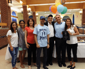From left: The Great Neck Spirits Coaches are Michele Murphy, Jackie Mazur, Diane Polland, Alan Someck, Ed Fernbach, Chris Brown and Jordana Cohen; Stacy Parisi is not pictured.