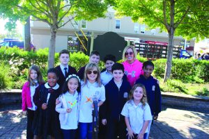 Students from St. Brigid/Our Lady of Hope School performed in the piazza. (Photo by Joe Catrone)