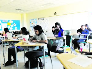 Students write letters to Albany officials to ask for aid for Westbury. 