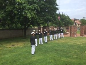 Members of the Firing Team from USMMA in Kings Point prepare to fire volleys in remembrance of the fallen soldiers.