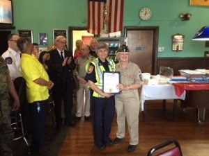 American Legion Post #160 Commander and GN Memorial Day Parade Chairperson Louise McCann honoring Nassau County Auxiliary Police Officer Maria D'Amelio for all her efforts in police control during the parade