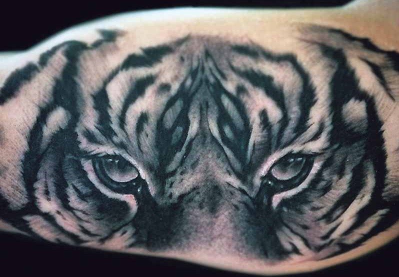black and white tattoo by Levine. (Photos courtesy of Lark Tattoo)
