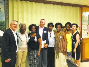 Rabbis Tara and Meir Feldman with the victim’s family during their visit to Charleston in July