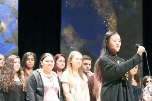 Susan Kim was the first soloist in The Wheatley Chorale’s “We Are the World.”  (Photos by David Rosenzweig)