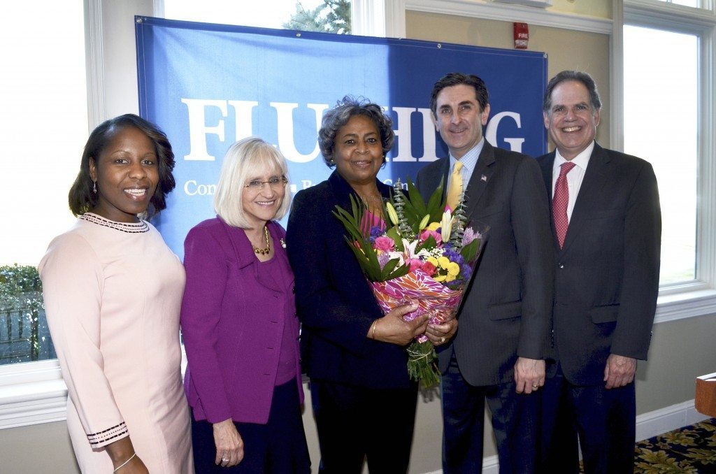 Jackie Caines (center) is honored by (from left) Councilmember Viviana Russell, Supervisor Judi Bosworth, Town Clerk Wayne Wink and Receiver of Taxes Charles Berman at the 23rd annual Women’s Roll of Honor.