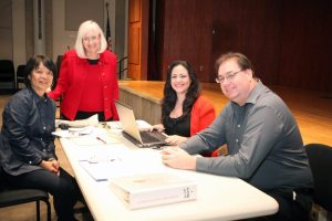 From left: A town resident meets with North Hempstead Supervisor Judi Bosworth, Applicant Advocate Lauren Summa and Glenn Norjen of the Building Department at a mobile hours session.