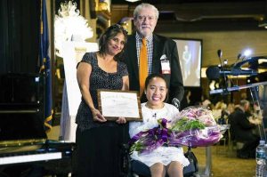 John D. Kemp, president and CEO of The Viscardi Center; Jennifer Noronha, occupational therapist at Henry Viscardi School; and Adeline Joshua, graduate of Henry Viscardi School and guest speaker at the Luncheon