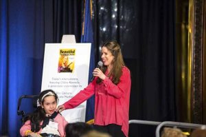 Chilina performing at the Reach for a Star Luncheon with Beste, a student at Henry Viscardi School at The Viscardi Center