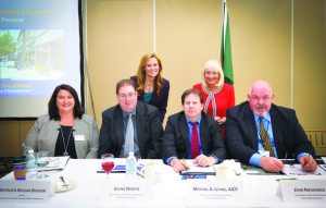 From left, seated: Kathleen Deegan Dickson, Esq; Deputy Building Commissioner Glenn Norjen; Planning Commissioner Michael Levine; Building Commissioner John Niewender; standing: BTDC Executive Director Kim Kaiman and Town Supervisor Judi Bosworth