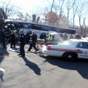 At the scene of a horrific crash on Roslyn Road by Argyle Raod where a Coach USA bus crashed into a pole to avoid an oncoming pick up truck.