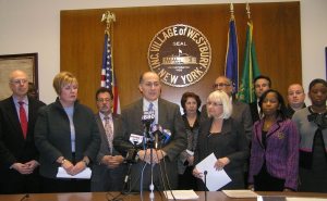 Local officials, including Village of Westbury mayor Peter Cavallaro, Town of Hempstead Supervisor Kate Murray and Town of Hemsptead Supervisor Judi Bosworth voiced their plans to apply for a restraining order against OTB. (Photo by Ray Muntz)