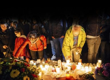 People gathering in solidarity with victims from Paris assaults