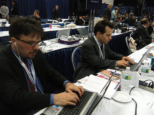 Anton Community Newspaper editors Dave Gil de Rubio and Rich Forestano plying their craft in the Debate Media Filing Center. Photo by Samuel Rubenfeld farmingdale 2012 10 debate 2 10 26 f5b8b0