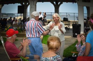 Supervisor Judi Bosworth dances with a senior at last year’s Funday Monday.