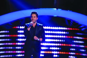 The Voice contestant’s singing debut was at Great Neck North.(Photo by Paul Drinkwater/NBC)