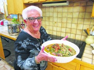 Rae with a big bowl of minestra soup 