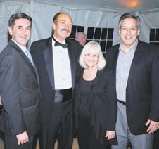 From left: North Hempstead Town Clerk Wayne Wink, Honoree Bruce Migatz of Albanese & Albanese, North Hempstead Supervisor Judi Bosworth and Special Advisor on Superstorm Sandy Relief Jon Kaiman at the Landmark gala last November