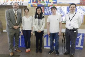 Schreiber High School Principal Ira Pernick and Assistant Principal Dr. Bradley Fitzgerald are pictured with the school’s National Merit Scholarship winners. (Photo courtesy Port Washington School District)