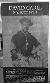 A large poster from the exhibit about David Carll in his Civil War uniform. Evans-Sheppard is a direct descendant of Carll, who is interred in the Pine Hollow Cemetery. He was a member of the AME Zion Church.
