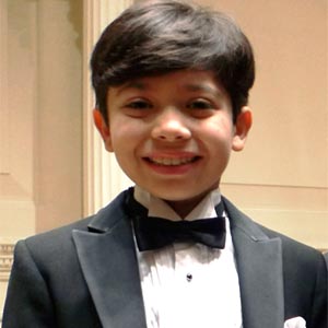 Benjamin Rossen, 11, whose family members in The Philippines were devastated by Typhoon Yolanda, will be a featured performer Dec. 7. He has performed in many concerts, including at Carnegie Hall.