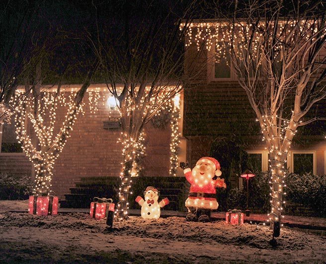 This Roslyn home with a welcoming Santa and Frosty the Snowman is at 20 Elm St.