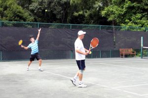 Participants took to the tennis courts for an extraordinary pro-am tennis tournament.
