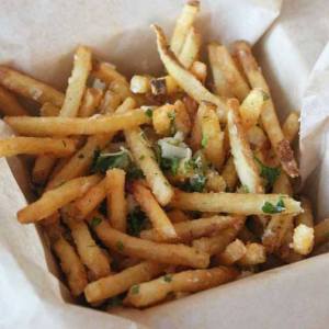 Spuntino's happy hour menu includes truffle fries