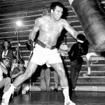 19 Page 12 working out in front of press 1972