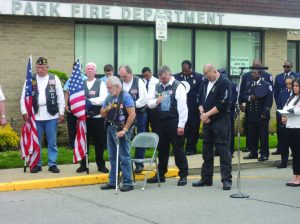 Members of the American Legion Elmont Post 1033 and the South Floral Park Volunteer Fire Department paying their respects during the singing of the National Anthem (Photos by Dave Gil de Rubio)