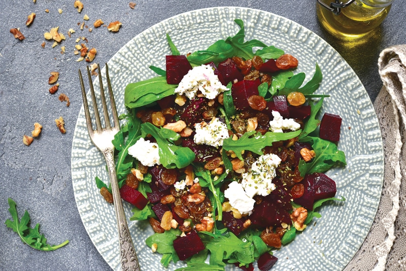 Warm beetroot salad with arugula,raisins and feta