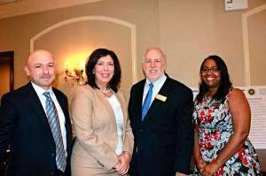 From left to right: James Joseph, principal, Joseph Law Group, P.C., & EAC Network Board chairman, Nassau County District Attorney Madeline Singas, Lance W. Elder, president and CEO, EAC Network, and Tania Peterson Chandler, vice president of Operations, EAC Network.