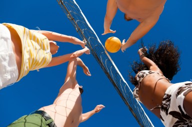 Beach volleyball – players on the net