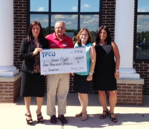 A donation check for $4,000 raised by TEAM TFCU was presented to Honor Flight, a nonprofit organization based in Southampton, at TFCU’s Riverhead Branch. Pictured are (lt. to rt.) are Santa Rodriguez of TFCU, Bill Jones and Virginia Bennett of Honor Flight and Jennifer Gunn of TFCU.