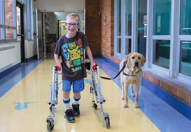 Ryan (Grade 3) walking with Sunny