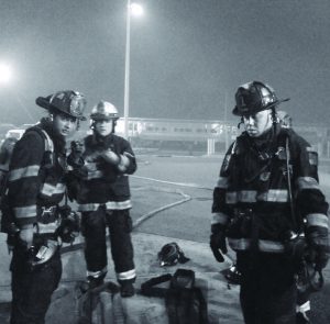 From left: Lieutenant Nabeel Arain, First Deputy Chief Tom Skinner (center) and ex-Captain George Somerset at the Fire Service Academy